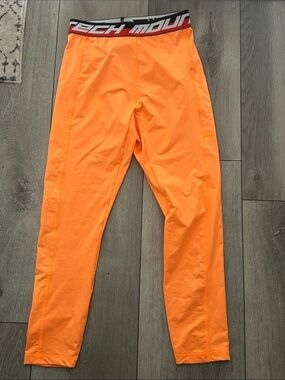 Super Cool Aztech Mountain Bright Orange Athletic Leggings